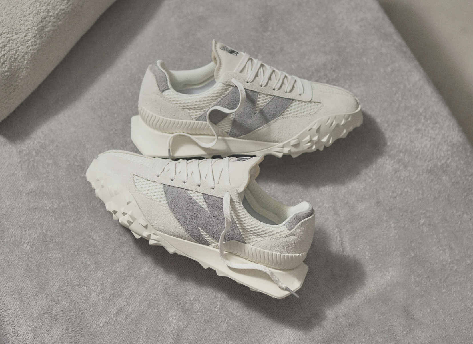 Grey shoes on a cream background